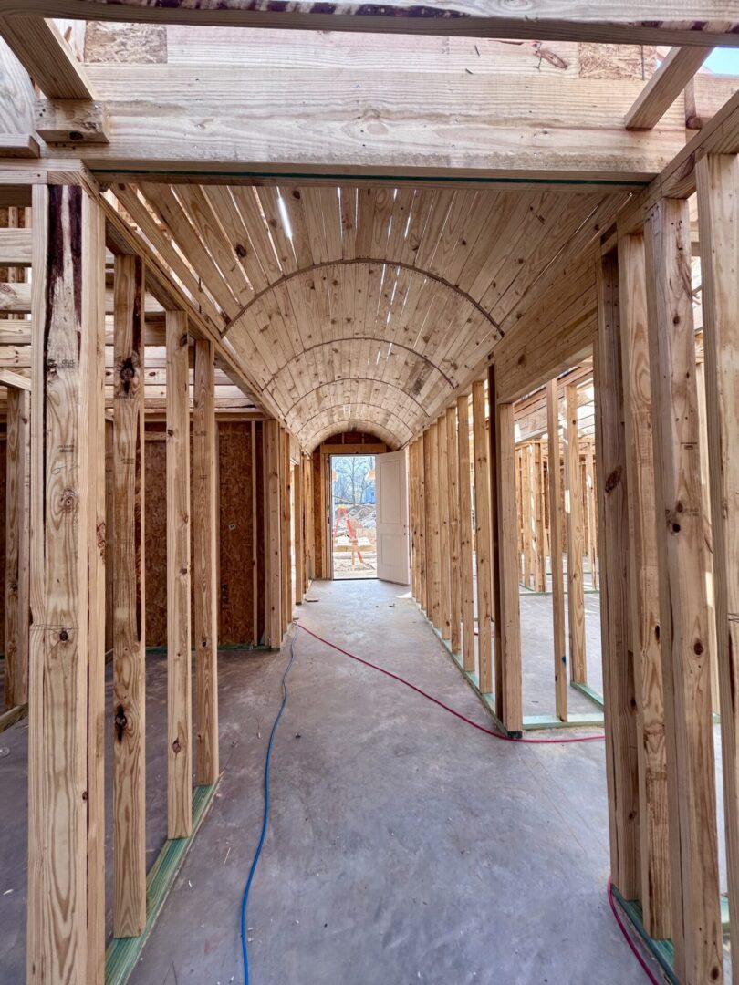 Wooden framework of a house under construction.